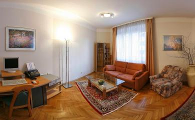Apt no. 6: Living room with computer work station and high quality pull-out sofa bed